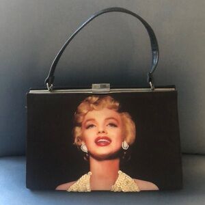 Marilyn Monroe pocketbook  1 side has sequence dress top & rhinestone earrings.